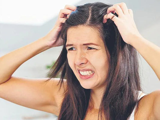 What are the main causes of Dandruff?